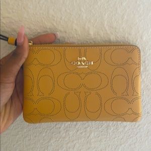Yellow coach coin purse